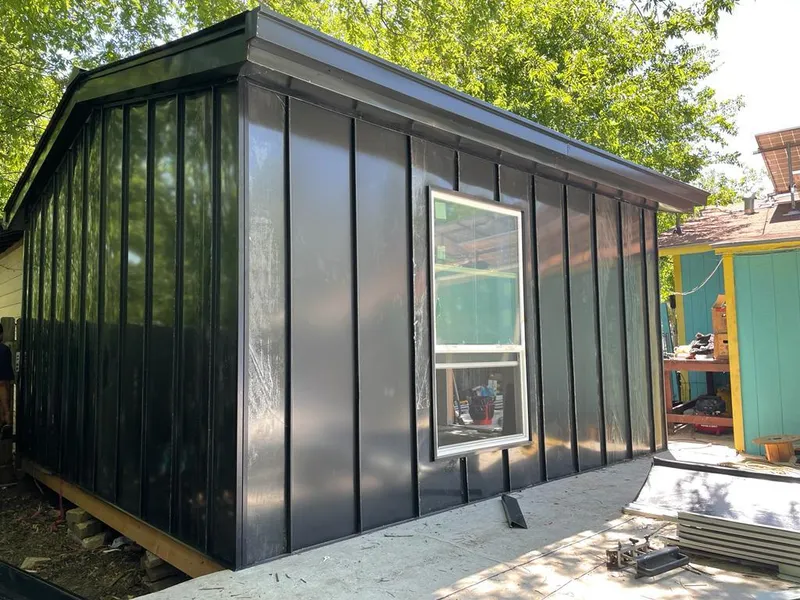 Black standing seam metal wall panels for Roof Inspection in East Chicago